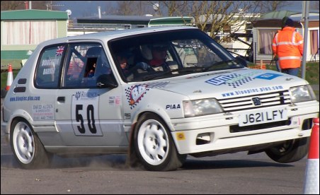 Jon Broughton and Rupert Barker in action in their Peugeot 205 GTi