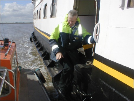 Harbour Master Peter Lee steps onto the Balmoral