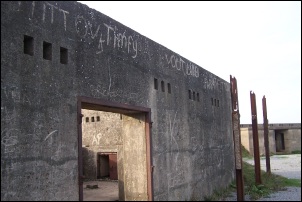 Graffiti on a gun emplacement building at Brean Down Fort