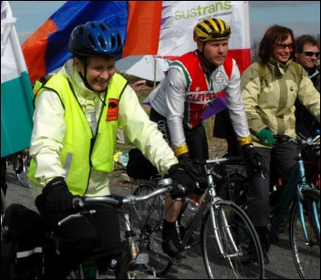 The first cyclists to use the path after the ribbon cutting