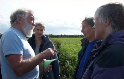 Professor Sir David Bellamy discusses the wind farm scheme with protesters
