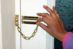 Put your door chain on to answer the door