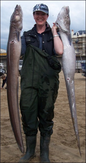 Sally Norris holds the two conger eels she caught during Sunday's Burnham sea fishing competition