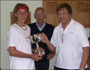 Nathan Edwards receiving a trophy after a win in Burnham