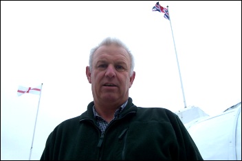 Professional flag repairer Wayne Orchard of Porthcawl's Celtic Flag Services