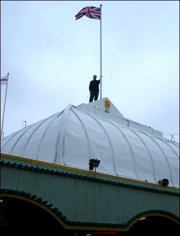 Burnham Pier's flags being replaced