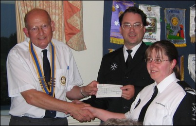 Mr Moon presented £500 to the Highbridge and Burnham branch of St John Ambulance