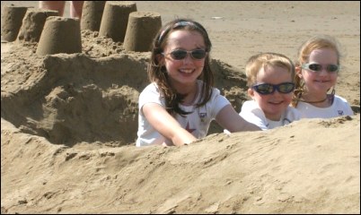 The prize for the most creative entry went to the Hill family - Analise (10), Hayden (5) and Bethany (7) - who formed a car in the sand.