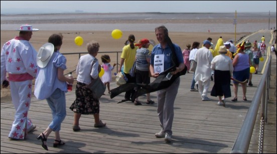 Participants in Sunday's Smile Walk set off 