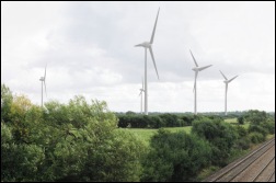 How the wind farm would look next to the railway line [Photomontage: Ecotricity]