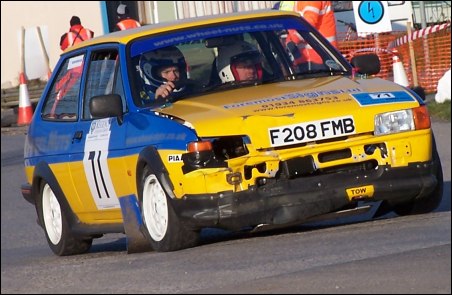 Simon Brace and Sean Williams in action in their slightly dented Fiesta XR2 