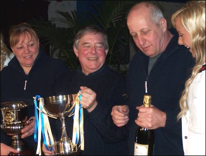 Steve and Yvonne Furzeland  being presented with their trophy by rally driver Russell Brookes