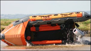 The boat flips back over onto its correct side