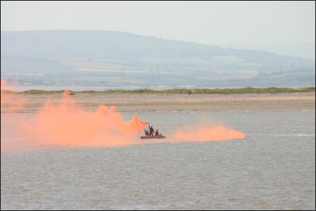 Orange smoke signified the start of the airbourne rescue exercise