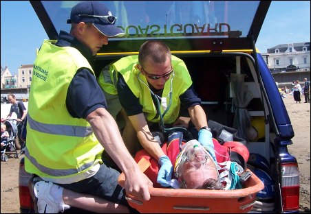 The 'casualty' Mel Gosling is taken by the Coastguard  to paramedics.