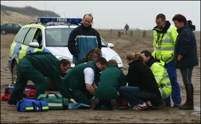 Paramedics helping the lady on Berrow Beach
