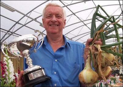 Burnham vegetable grower Bert Stone won the Barclay Cup for his prize onions