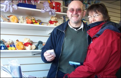 Customers Jenny and Bob Reed from Bristol browsing through merchandise at the new RNLI shop