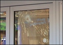 The broken glass door at Peacocks in Burnham-On-Sea