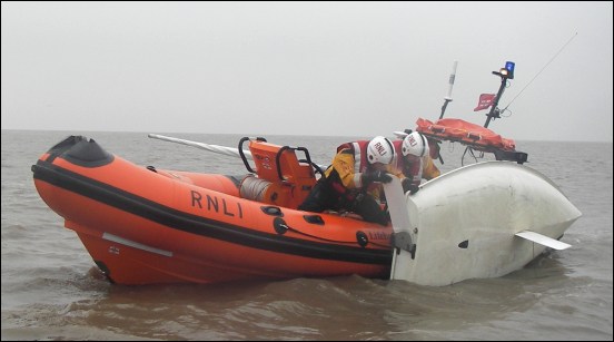 The capsized dinghy