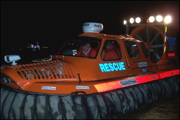 The hovercraft's searchlights were switched on to aid in the rescue