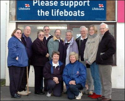 Burnham-On-Sea RNLI Supporters Group members outside their new seafront shop