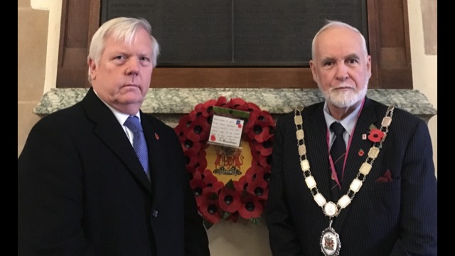 Council Leader, Cllr David Fothergill and Chairman, Cllr Nigel Taylor laying a wreath at the memorial.