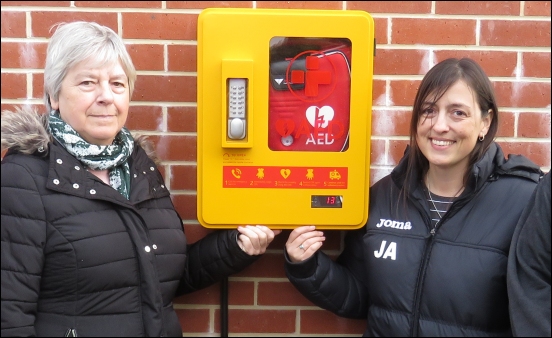 Carol Dyer of Berrow Community Association, Nikki Askins of Uphill Castle Football Club, with the new defibrillator