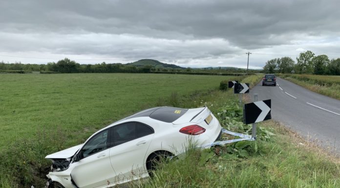 Car in ditch Burnham Moor Lane