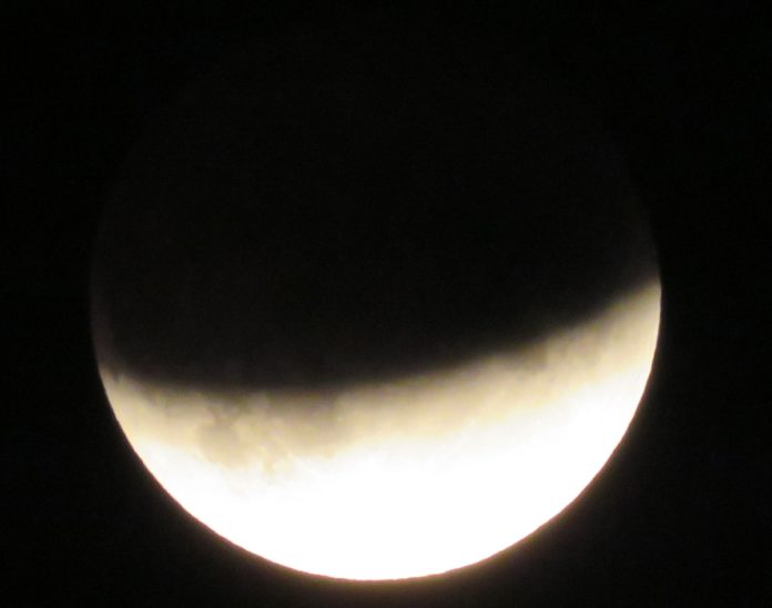 Partial lunar eclipse photographed from BurnhamOnSea seafront