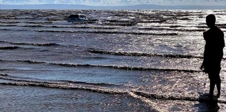 Car is lost to incoming tide on Brean Beach after getting stuck in soft sand and mud