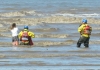 Burnham-On-Sea Coastguards rescue girl stuck in mud in sea water on Brean beach