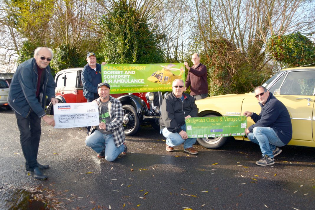 Bridgwater Classic and Vintage Club presents funds to Dorset and Somerset Air Ambulance
