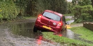 Car in ditch in Church Road, West Huntspill