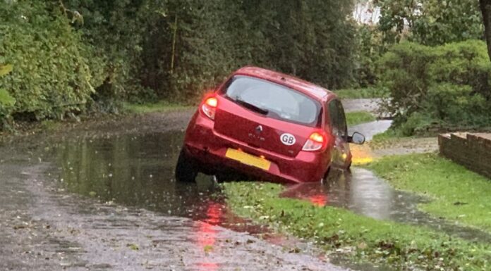 Car in ditch in Church Road, West Huntspill