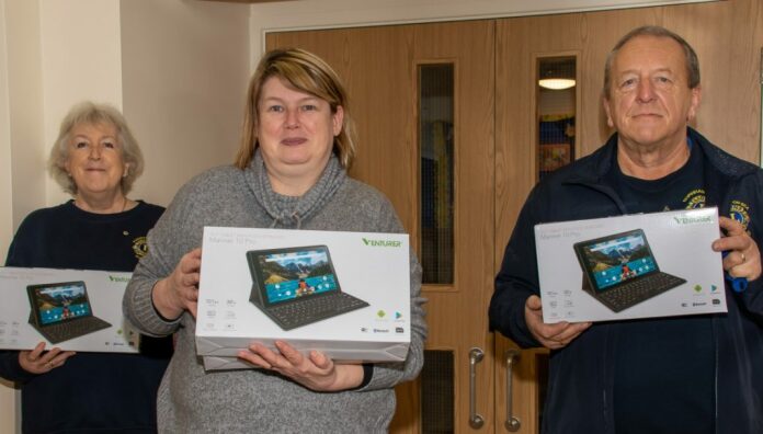 Burnham-On-Sea Lions donate computers for local schools