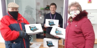Burnham In Bloom deliver almost £2,000 of tablet computers to local schools
