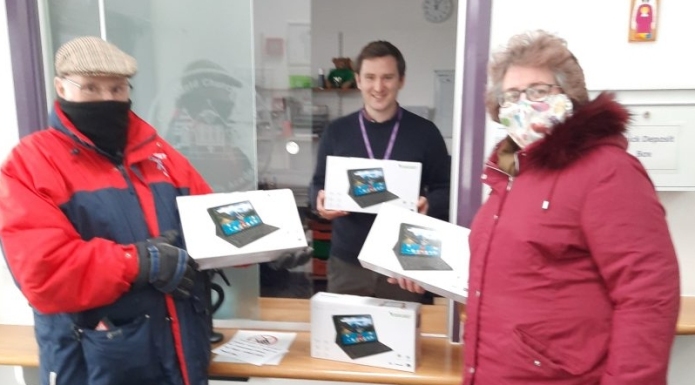 Burnham In Bloom deliver almost £2,000 of tablet computers to local schools