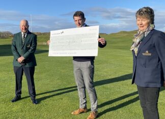 Somewhere House Somerset gets the cheque from Berrow & Burnham Golf Club captains