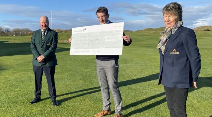 Somewhere House Somerset gets the cheque from Berrow & Burnham Golf Club captains
