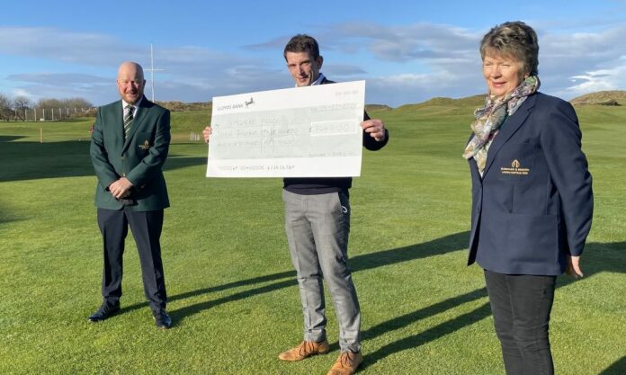 Somewhere House Somerset gets the cheque from Berrow & Burnham Golf Club captains