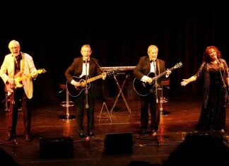 Former BBC Points West correspondent Clinton Rogers has swapped his camera and microphone for a guitar – and he will be bringing his band to the stage at Burnham-On-Sea this summer.