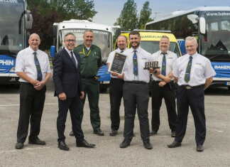 Local coach operator Bakers Dolphin, whose drivers volunteered to help the ambulance service when lockdown struck in 2020, have been recognised with a top industry award.
