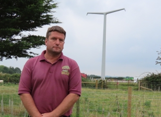 Rob Davey with a Hinkley Point T-Pylon in the background at East Huntspill