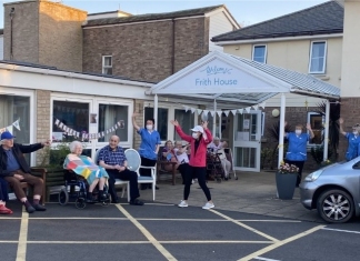 Frith House residents and staff get ready to greet the cyclists (c) Somerset Care