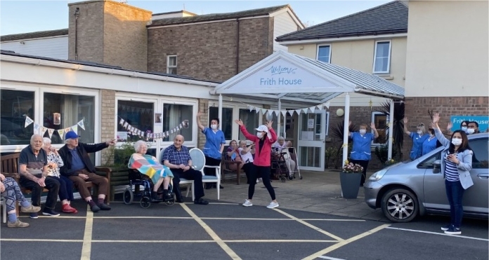 Frith House residents and staff get ready to greet the cyclists (c) Somerset Care