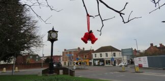 Hundreds of knitted bells have been spread around Highbridge this weekend in a festive 'yarn bombing' that aims to spread positivity.