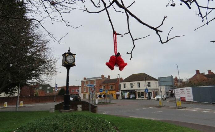 Hundreds of knitted bells have been spread around Highbridge this weekend in a festive 'yarn bombing' that aims to spread positivity.