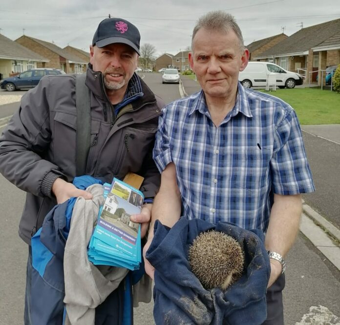 Local councillors rescue stranded hedgehog from manhole while on election trail