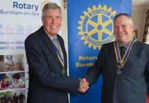 Burnham-On-Sea Rotary Club President David Stickels with outgoing President Chris Ashton